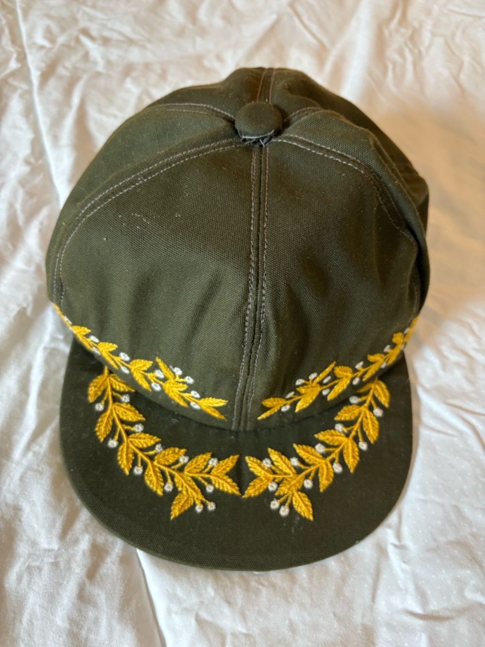 Embroidered Olive Green Baseball Cap with Yellow Leaf Detail